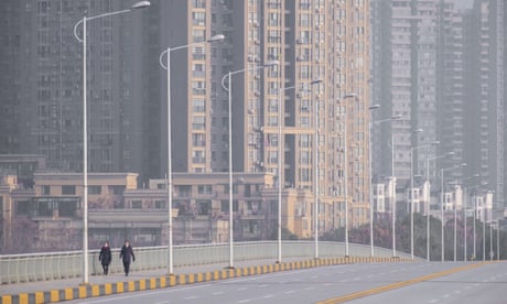 ‘Last chance’: WHO reveals new team to investigate Covid origins 6 People on a deserted street in Wuhan in late January 2020