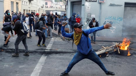 Violent protests in Ecuador force government to move – video
