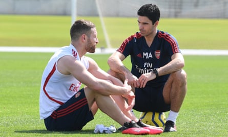 Mikel Arteta talks to Shkodran Mustafi during the warm-weather training camp.