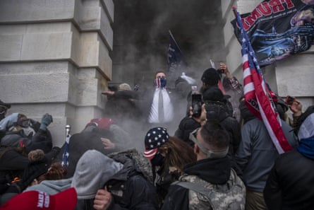 Demonstrators attempt to breach the US Capitol after they earlier stormed the building in Washington, DC, US, on January 6 2021
