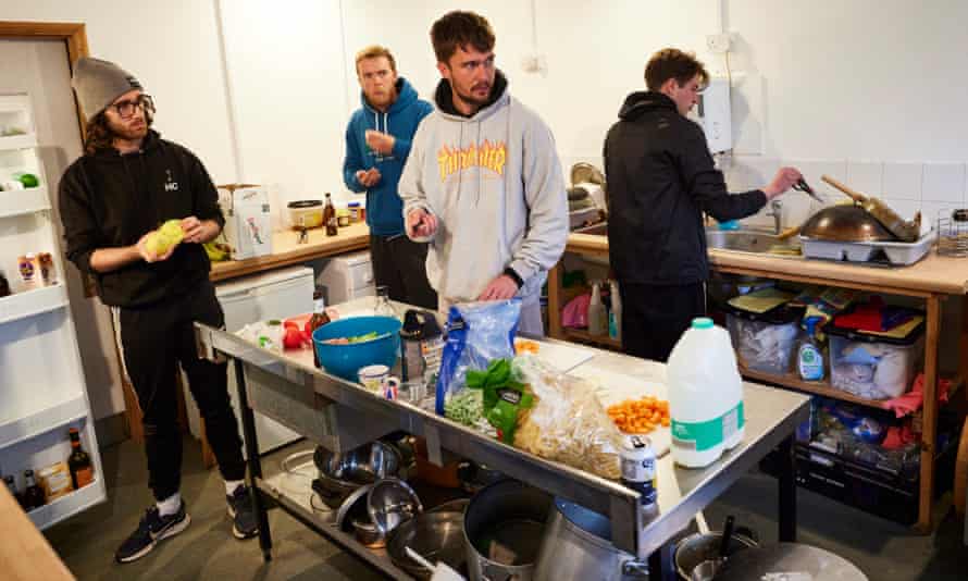 (From left) Harry Clarke (Ross, Seyton), Samuel Lane (Banquo, Mentieth, Gentleman, Siward), Ronnie Yorke (Macbeth, Sergeant) and Rhys Warrington (Lady Macbeth, Third Weird Sister, Young Siward) cook dinner together at their Stanley Hall base camp in Essex.