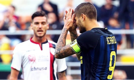 Mauro Icardi, right, reacts after missing a penalty for Internazionale in the defeat by Cagliari.