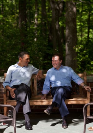 Obama chats with Russian Prime Minister Dmitry Medvedev on the Laurel Cabin patio