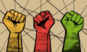 Raised fists of solidarity in colours of yellow, red and green