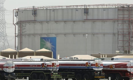 Storage tanks and fuel trucks at an Aramco oil facility in Jeddah, Saudi Arabia.