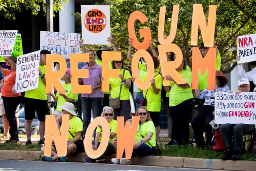 Supporters of gun control reform protest against the NRA at their headquarters in Fairfax, Virginia.