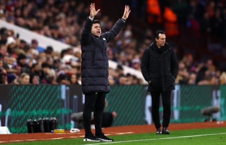 Mauricio Pochettino raises his hands on the touchline