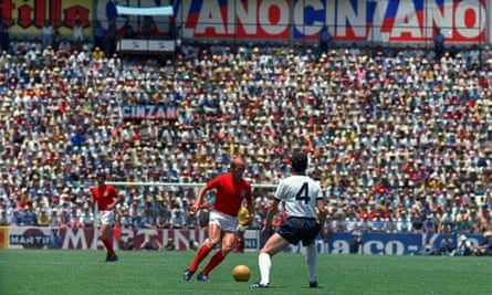 Bobby Charlton, attempts to take on Franz Beckenbauer during England’s World Cup quarter-final defeat to West Germany in Mexico in June 1970