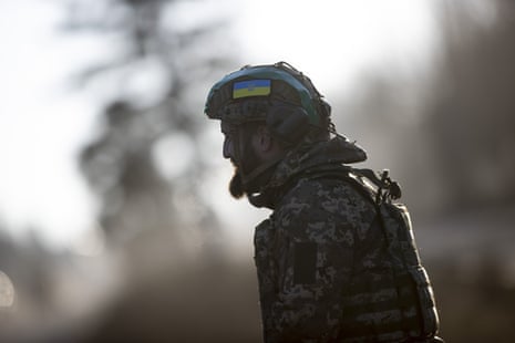 A Ukrainian soldier is seen on his way to the frontline.