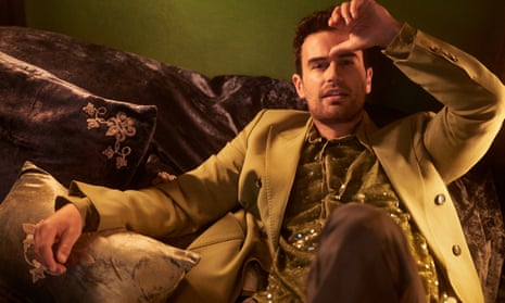 Theo James wears blazer, sequinned shirt and trousers, all from amiparis.com