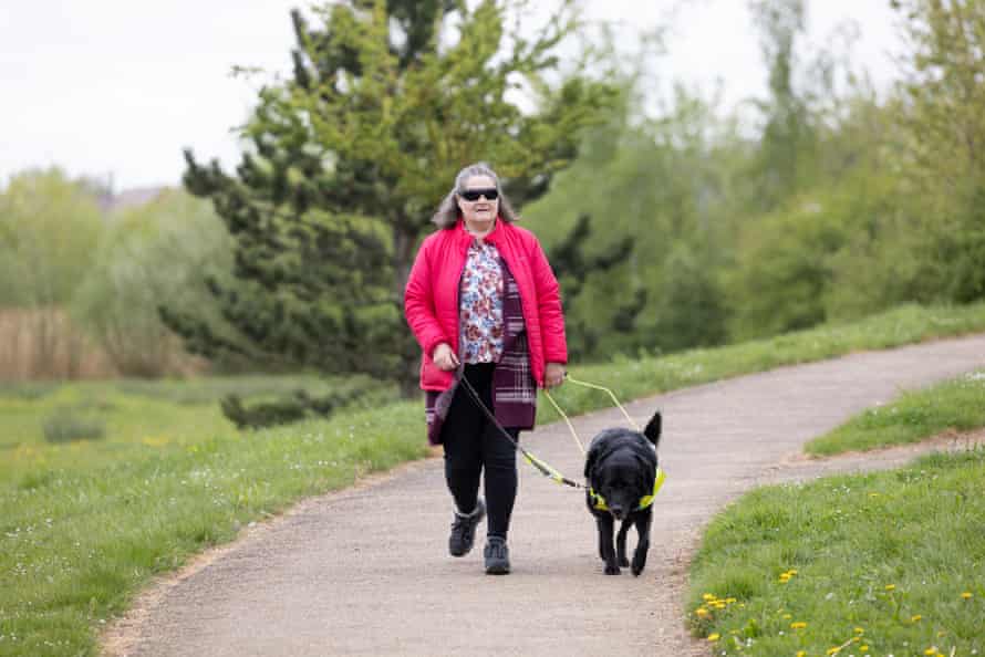 ‘You can’t hear them’ … Elaine Maries with her dog, Inca.