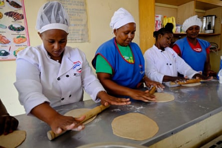 Women are taught how to make chapatis ahead of migrating to Saudi Arabia at The East African Institute of Homecare Management near Nairobi.