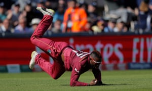 Fabian Allen of West Indies catches out Chris Woakes of England.