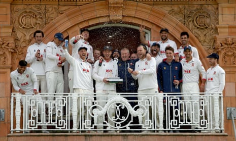 The Essex players celebrate on the Lord’s pavilion balcony after beating Somerset to win the Bob Willis Trophy on Sunday.