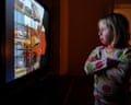 Little girl watching television