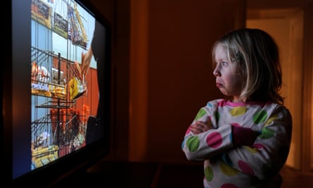 Little girl watching television