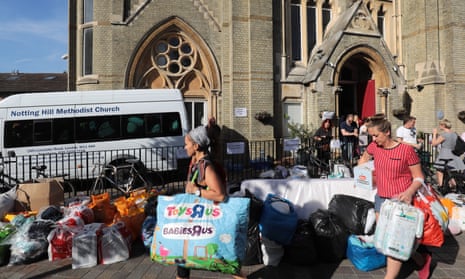 People leave donations outside the Notting Hill Methodist church.