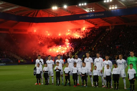 FC Copenhagen fans let off flares ahead of the Champions League match between Leicester City and FC Copenhagen