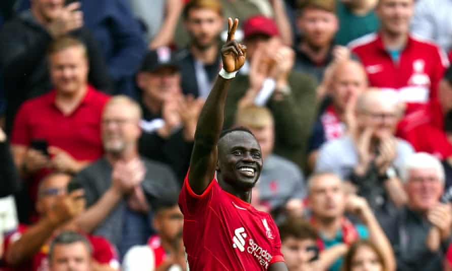 Sadio Mané celebrates his landmark strike.