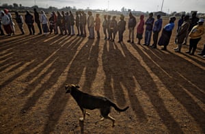 Bekkersdal, South Africa. Voters queue in the early morning sun in the mining settlement west of Johannesburg. South Africans are voting in a national election that pits President Cyril Ramaphosa’s ruling African National Congress against top opposition parties Democratic Alliance and Economic Freedom Fighters