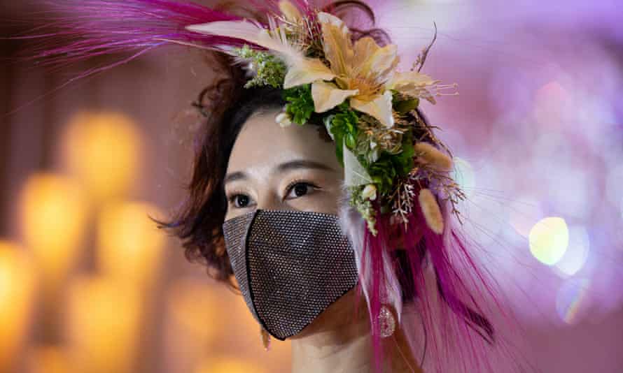 A model looks on during the 2020 Korea Mask Fashion show in Seoul, South Korea.