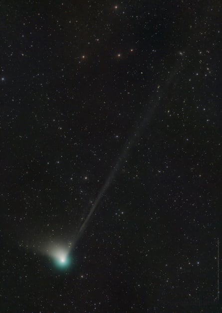 A vertical shot of the green comet