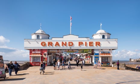 Entrance to the Grand Pier, Marine Parade, Weston-super-Mare: it is seen on a bright sunny day under a clear blue sky