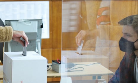 A person casts vote at a polling station, during parliamentary and presidential elections, in Sofia, Bulgaria, on 14 November, 2021.