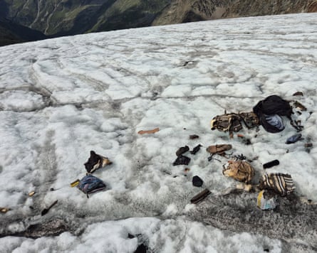 Some belongings partly buried by ice and snow.