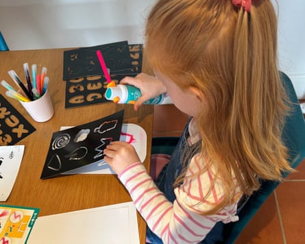 A child playing with an art kit