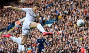 Luke Ayling spectacularly volleys in Leeds’ opening goal against Huddersfield on Saturday.