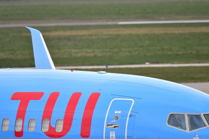 A TUI aircraft parked at Hanover airport, Germany. The travel firm has cancelled all its beach holidays for the next five weeks