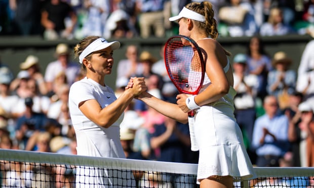 Simona Halep from Romania and Elena Rybakina from Kazakhstan shake hands at the net after their semi-final at Wimbledon.