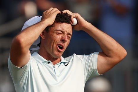 Rory McIlroy of Northern Ireland reacts after bogeying the 18th hole.