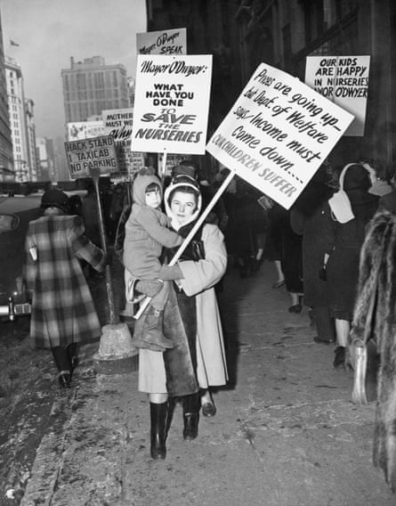 a woman holds a sign that reads ‘press are going up but dept. of welfare says income must come down... children suffer’