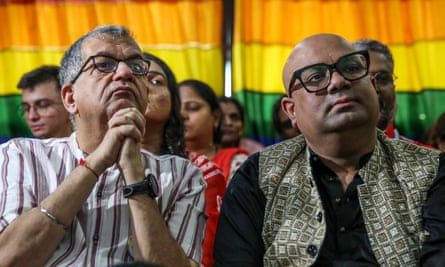 People at LGBTQ+ advocacy group the Humsafar Trust in Mumbai listening to the verdict