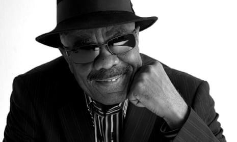 Jazz musician Rudy Smith in a brimmed hat and sunglasses