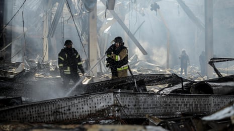 Ukrainian supermarket hit by missile as fighting grows inside Russia – video