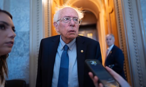 Bernie Sanders speaks with reporters as the Senate prepares to advance the $95bn aid package for Ukraine, Israel and Taiwan at the Capitol, on 23 April.