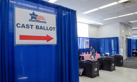 Blue 'cast ballot' sign in polling place