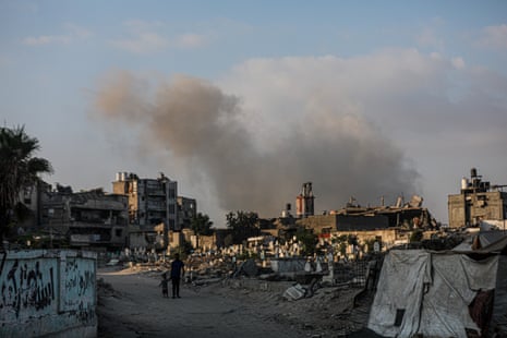 Smoke rises over residential buildings following the Israeli attack on ez-Zeytun and Shuja'iyya neighborhood in Gaza City, Gaza on August 21,2025.