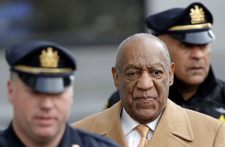 In this April 12, 2018 file photo, Bill Cosby, center, leaves his sexual assault trial at the Montgomery County Courthouse in Norristown, Pa
