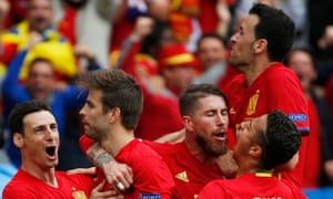 Gerard Pique and teram mates celebrate after scoring the opening goal.