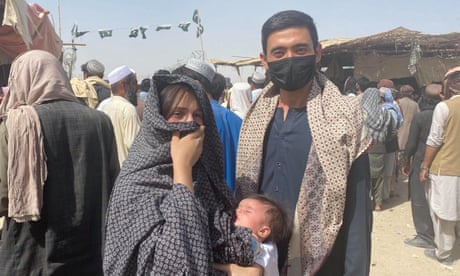 Sher Ali with his wife and small baby who fled Kabul and reached Chaman, Pakistan on Thursday. 