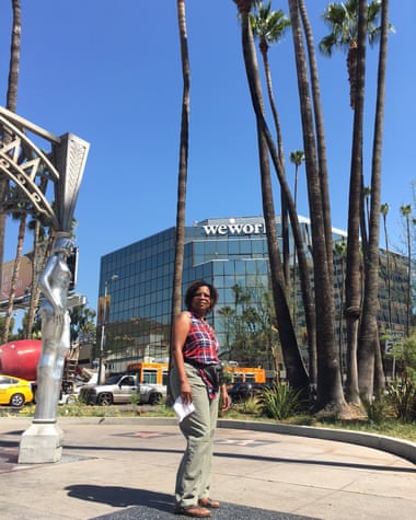 Becky Saava, a Ugandan tourist, on the Hollywood Walk of Fame.
