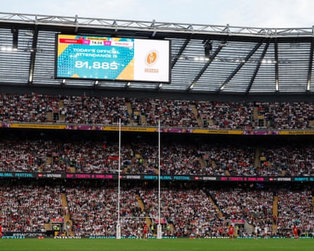 The screen inside the stadium displays the world record attendance of 81,884