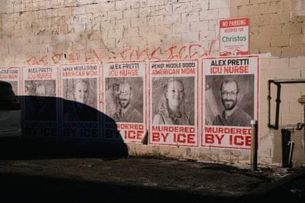 Mural with portraits of a man a woman, the text at the bottom reads “Murdered by Ice”