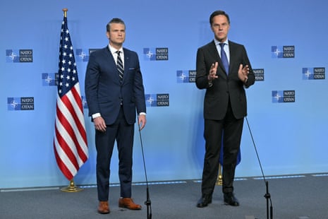Nato Secretary-general Mark Rutte (R) and US Secretary of defense Pete Hegseth deliver remarks in Brussels, 5 June.