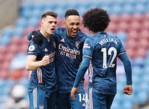 Aubameyang celebrates scoring their first goal with Granit Xhaka and Willian.