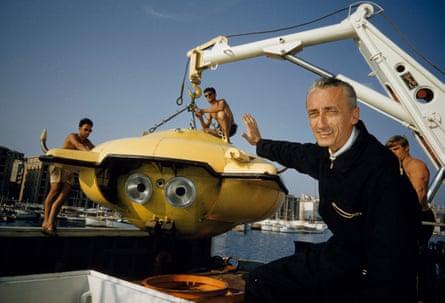 Jacques Cousteau with one of his underwater research vessel, the bathyscaphe Calypso, in Puerto Rico.